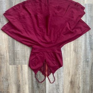 Red cocktail dress! V-neck fit. Open back. Lace racerback straps.